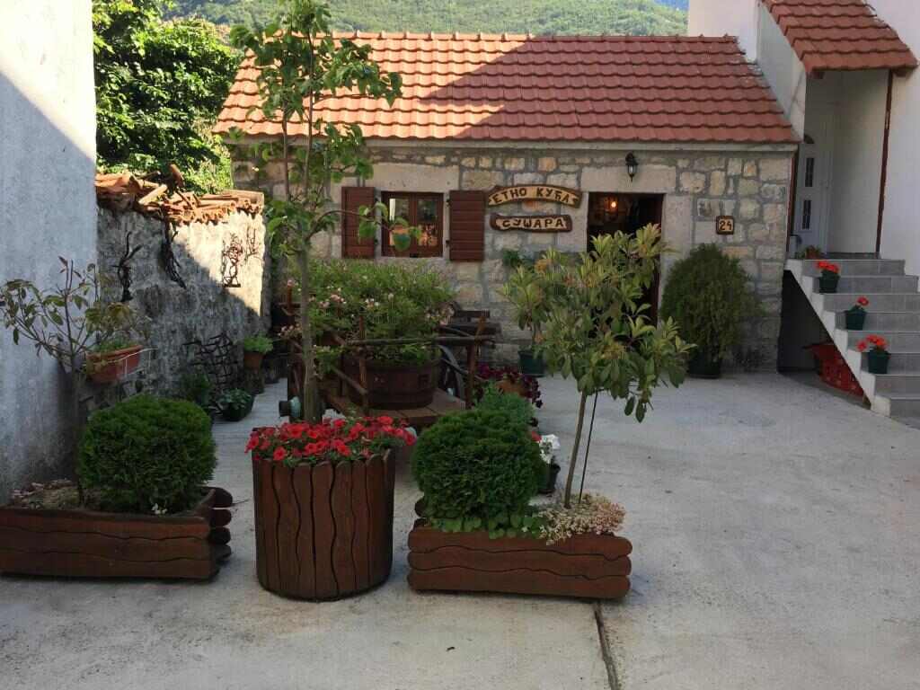 Stone courtyard and garden of the guest house